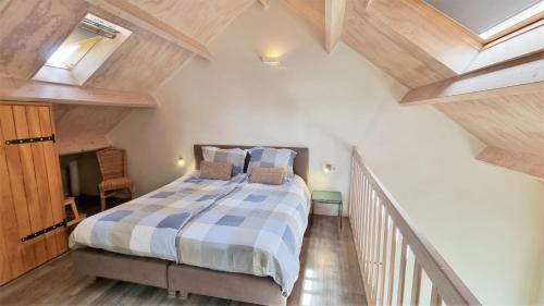 Postel nebo postele na pokoji v ubytování DCG57 Vakantiewoning met zicht op de molen