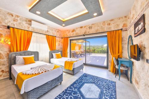 A bed or beds in a room at Villa Isında konağı