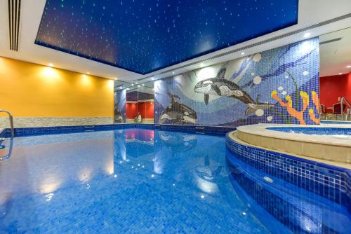 Kolam renang di atau dekat dengan Continent Al Waha Hotel Riyad