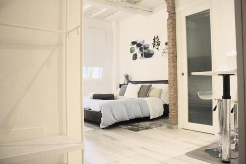 En eller flere senger på et rom på Appartamento in via San Gallo