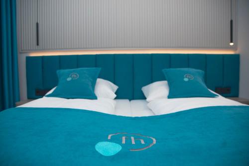 Ένα ή περισσότερα κρεβάτια σε δωμάτιο στο Friends Hotel Kerpen