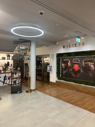 a view of a store with a sign on the wall at Design Hotel Winterrot in Karlsruhe