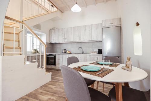Kuchyň nebo kuchyňský kout v ubytování Whitelist Maisonette I and II in Mykonos Town