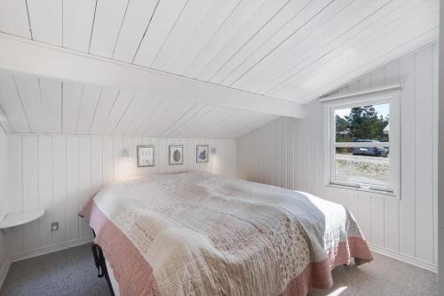 Ένα ή περισσότερα κρεβάτια σε δωμάτιο στο Cozy Holiday Home in Lovely Surroundings