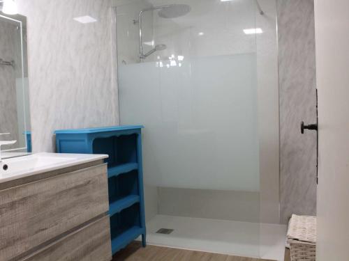 a bathroom with a shower with a glass door at Maison Port-la-Nouvelle, 3 pièces, 7 personnes - FR-1-229C-673 in Port-la-Nouvelle