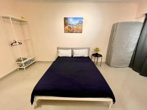 Katil atau katil-katil dalam bilik di 6-12pax The Premium House - The Heart Of Sunway