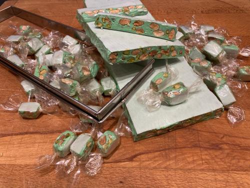 a group of wrapped boxes sitting on top of a table at B&B Vassy Etaule in Avallon