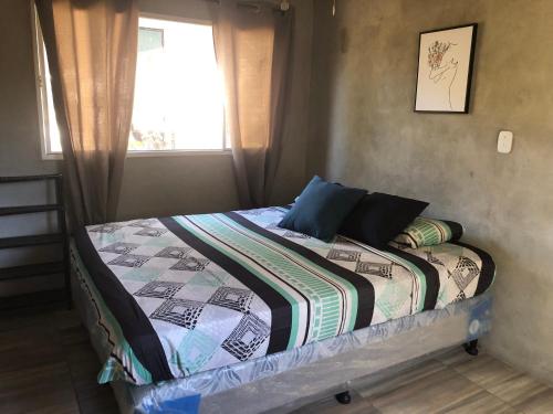 Ein Bett oder Betten in einem Zimmer der Unterkunft Casa luna punta mango surf