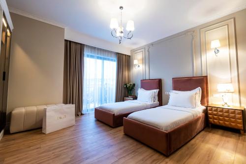 Postel nebo postele na pokoji v ubytování Diamma Resort Conference & Spa