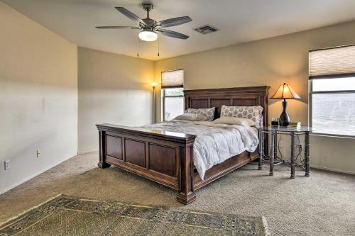 a bedroom with a bed and a ceiling fan at Casa Grande Home Near Golf, Dining and Shops! in Casa Grande