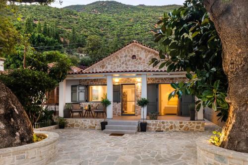 a house with a view of a mountain at The Beach House, Skaloma in Nafpaktos