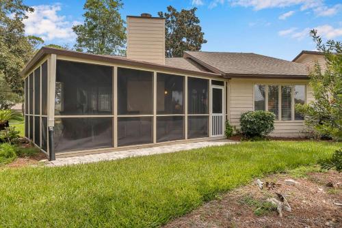 a house with a screened in porch at Endless Summers in Ponte Vedra Beach