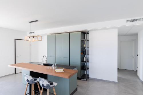 Η κουζίνα ή μικρή κουζίνα στο Villa la Matta Apartments and Luxury suites