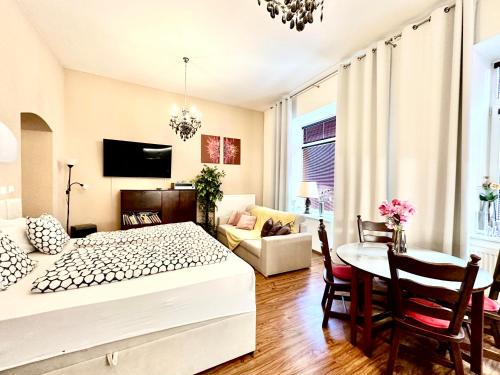 Ένα ή περισσότερα κρεβάτια σε δωμάτιο στο Home Away main square apartment