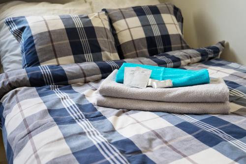 Un pat sau paturi într-o cameră la Studio Centrum