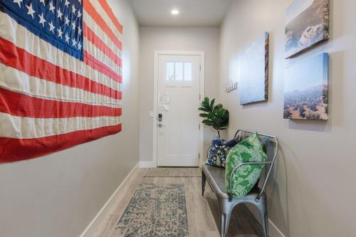 a hallway with an american flag on the wall at Ocotillo Springs 2 Includes a Private Hot Tub in Santa Clara