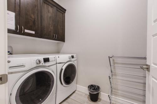 a white washer and dryer in a kitchen at Ocotillo Springs 2 Includes a Private Hot Tub in Santa Clara