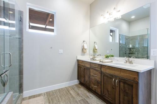 a bathroom with a sink and a mirror at Ocotillo 69 3 Bedrooms with a Private Hot Tub, Fire Pit, and Private Patio in Santa Clara