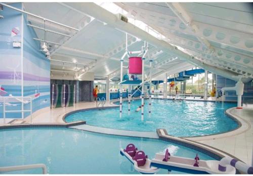 a large swimming pool on a cruise ship at Beautiful caravan near Edinburgh Seton Sands nr117 in Longniddry