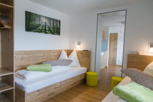 Postel nebo postele na pokoji v ubytování Haidegger Appartements