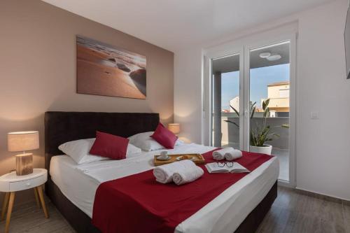 Posteľ alebo postele v izbe v ubytovaní Apartments Cesare