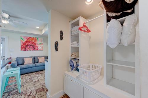 a living room with a couch and a blue couch at Casa Mariposa SPV19 in Port Aransas