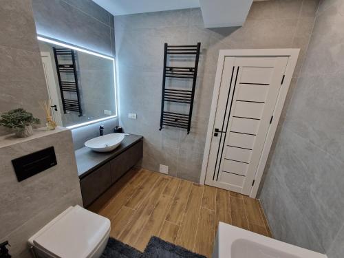 Bilik mandi di Dendrarium Park Apartment Deluxe