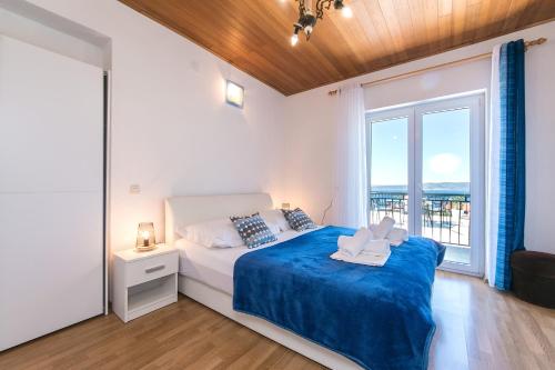 Postel nebo postele na pokoji v ubytování Apartments with a parking space Brela, Makarska - 16603