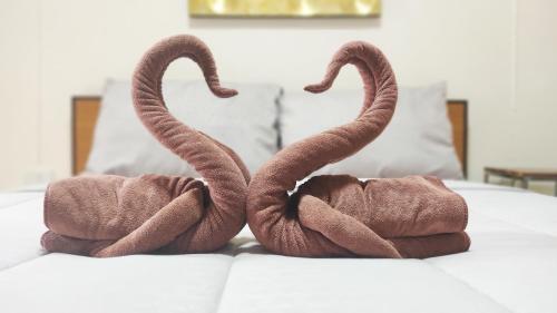Ένα ή περισσότερα κρεβάτια σε δωμάτιο στο 66 Apartment