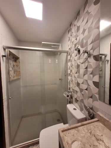 Ένα μπάνιο στο Condominio Winterville 3 Quartos