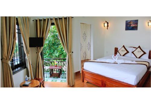 Giường trong phòng chung tại Cam Nam Homestay