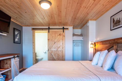 Ένα ή περισσότερα κρεβάτια σε δωμάτιο στο Terimore Lodging by the Sea