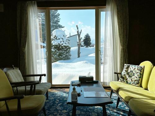 Χώρος καθιστικού στο 鹿家 Furano Dear House