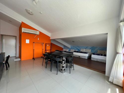 Una cama o camas en una habitación de Mang Yi Zhan Inn