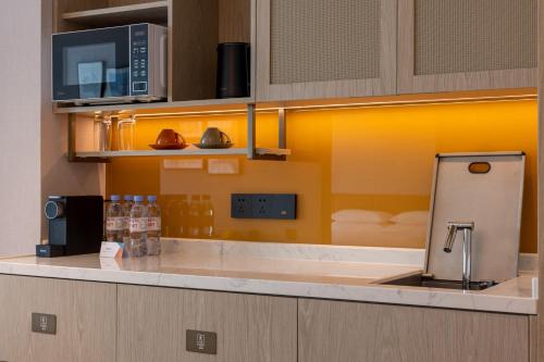 Kuchyň nebo kuchyňský kout v ubytování Home2 Suites by Hilton Guiyang Airport