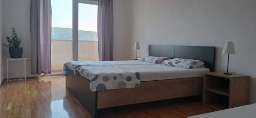 Posteľ alebo postele v izbe v ubytovaní Studio apartment with balcony