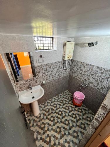 Koupelna v ubytování VAIBHAV HOME STAY