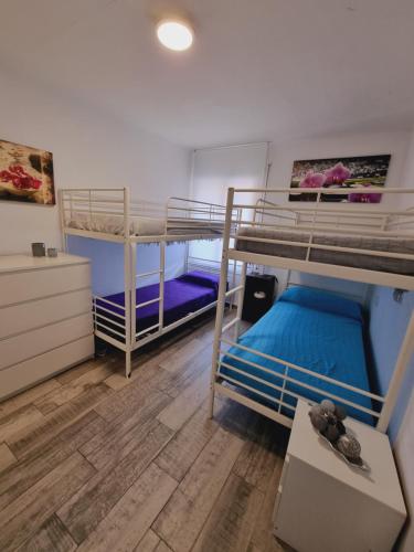 Postel nebo postele na pokoji v ubytování C ZARAGOZA JUNTO PLAYA 100m