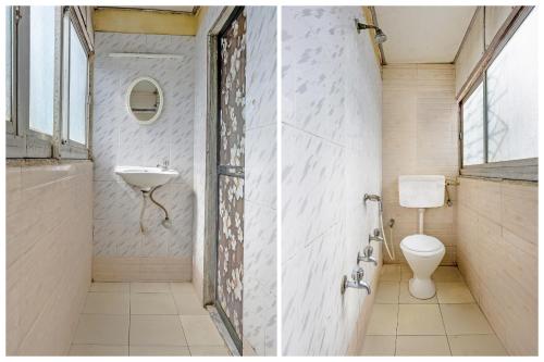 a bathroom with a sink and a toilet at Terminus Hotel Bandra in Mumbai