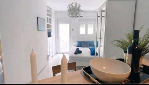 Een zitgedeelte bij Mango / Estudio con piscina!!!