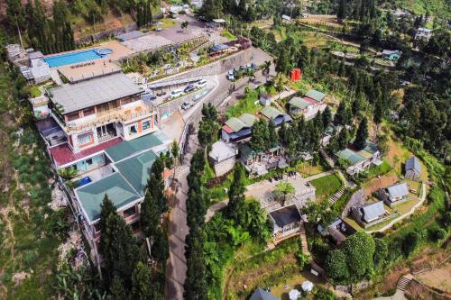 an aerial view of a house with a yard at Alinson Sunset Hill in Bogor