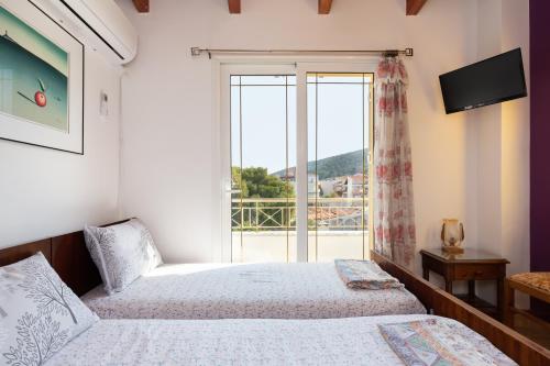 Postel nebo postele na pokoji v ubytování Golden Seaside House number 1