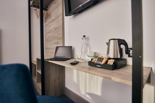 a room with a counter with a laptop on it at Caban, Pendine Sands in Pendine