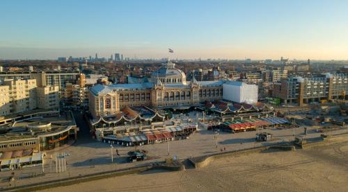 an aerial view of a large city with buildings at Helena at Sea Apartments in Scheveningen