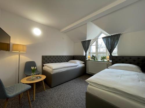 Postel nebo postele na pokoji v ubytování Hotel COLCHI