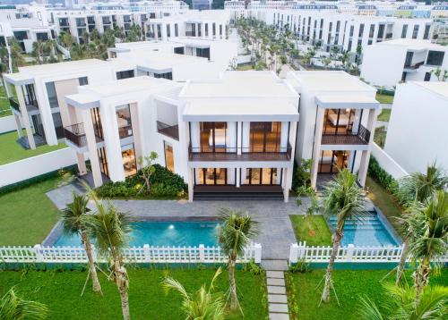 an aerial view of a house with a swimming pool at Oakwood Ha Long in Ha Long