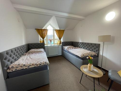 Ein Bett oder Betten in einem Zimmer der Unterkunft Hotel COLCHI