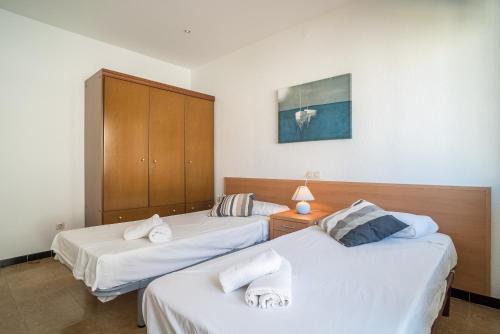 Postel nebo postele na pokoji v ubytování Canet Beach 1