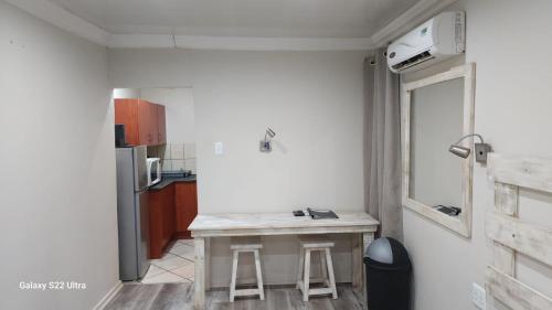 Η κουζίνα ή μικρή κουζίνα στο Rusplek Guesthouse and Conference Centre