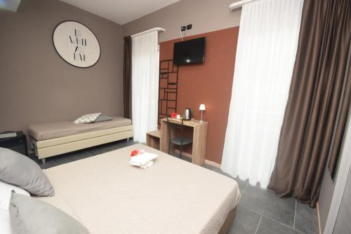 Katil atau katil-katil dalam bilik di Hotel Crisvan